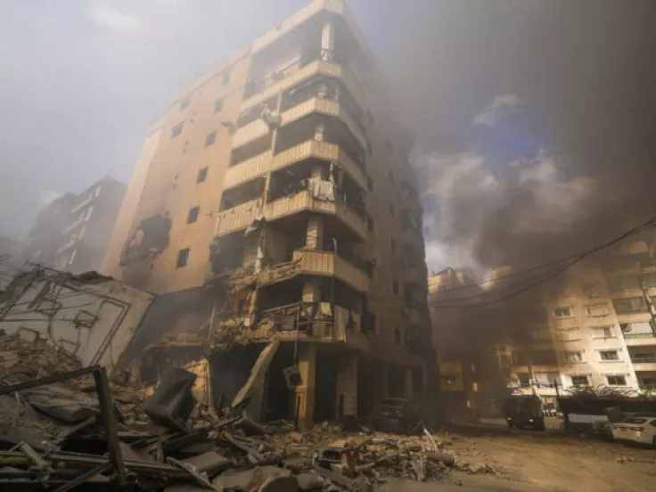 Smoke rises from the site of an Israeli airstrike in Dahiyeh, Beirut, Lebanon, Wednesday, Oct. 2, 2024. (AP Photo/Hassan Ammar)