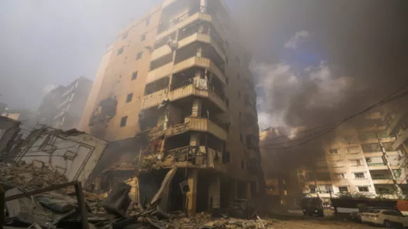 Smoke rises from the site of an Israeli airstrike in Dahiyeh, Beirut, Lebanon, Wednesday, Oct. 2, 2024. (AP Photo/Hassan Ammar)